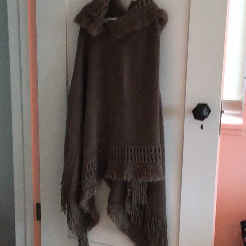 Brown hooded poncho.